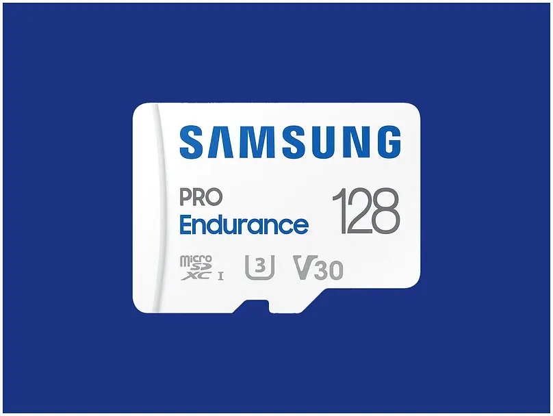 MicroSD card inserted into a security camera for recording.