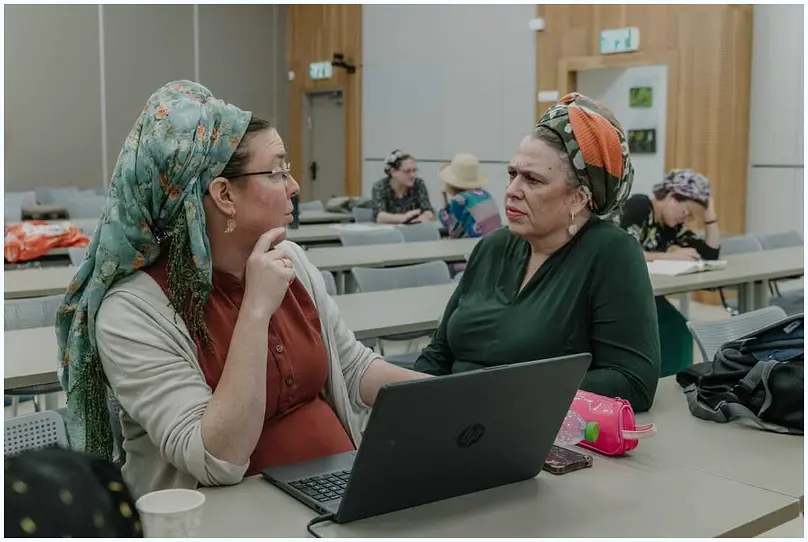 Rabbanit Batya Krauss in conversation with a student.