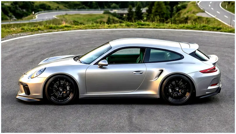 Custom orange Porsche 911 shooting brake rendering.